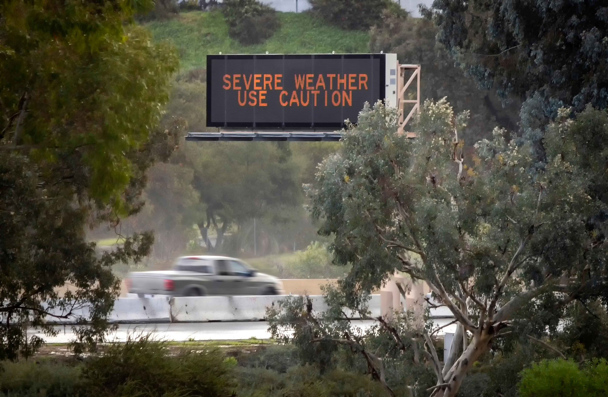 Freeway warning sign alerting drivers to sever weather