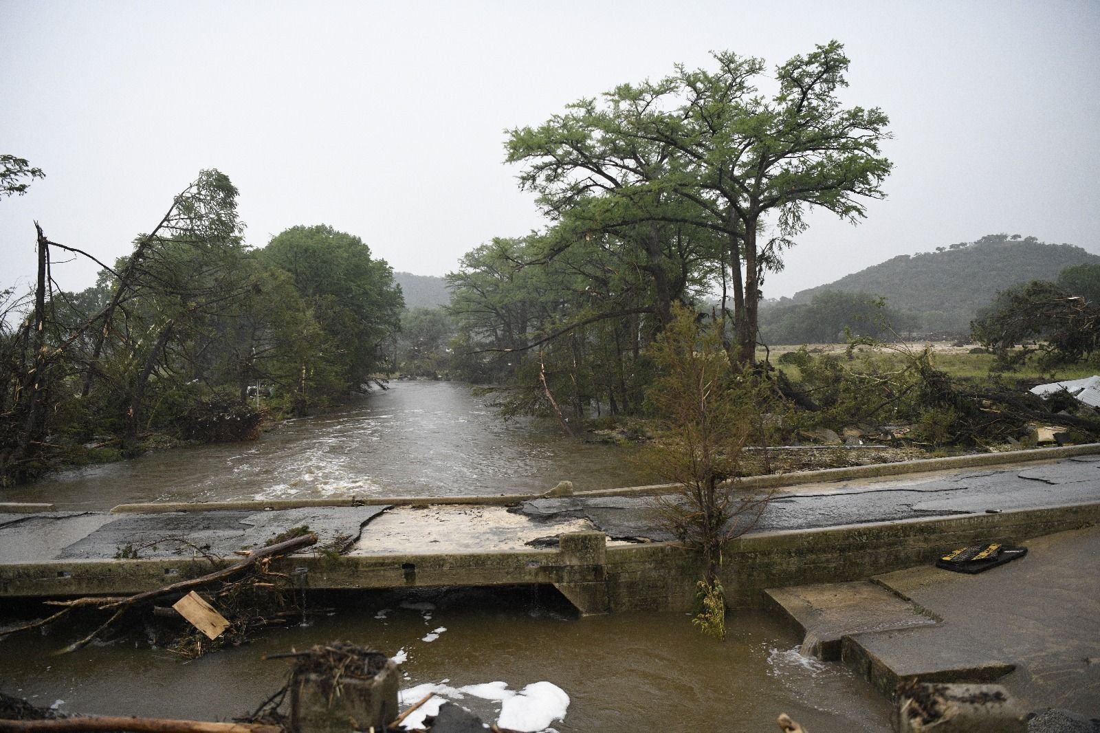 local roadway bridge washed out in Texas flash flood